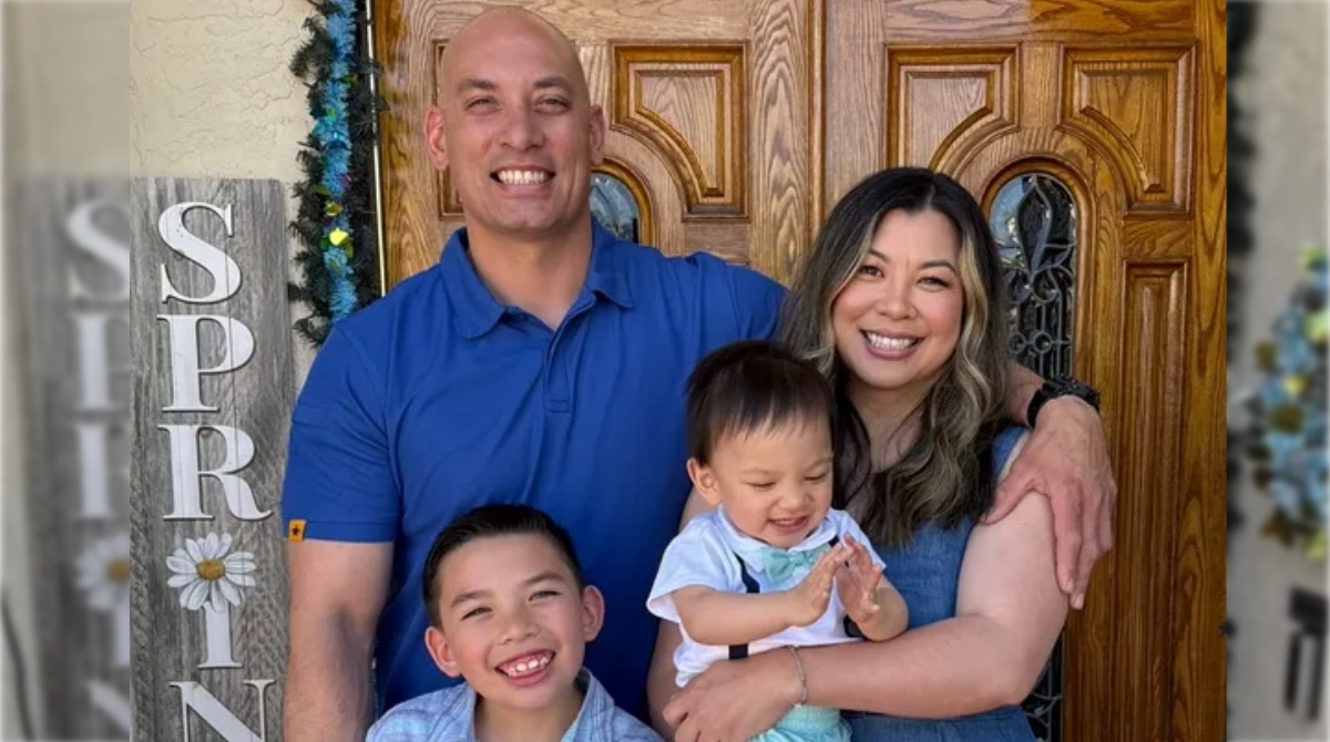 Support Officer Mitchell Collier and his wife and two sons